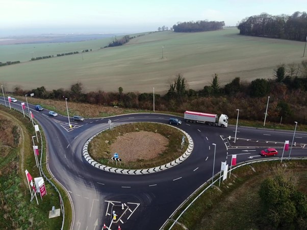 New roundabout on A505 with access roads into development